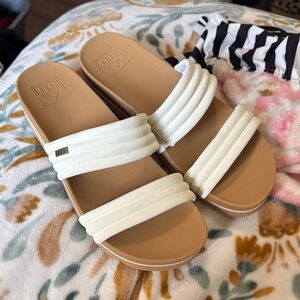 Reef Cream and Tan Slide Sandals